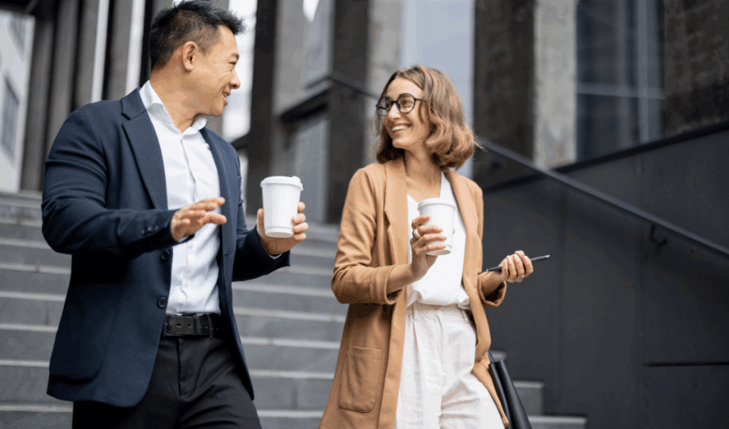 A picture of two colleagues walking together showing that walking enhances work and ethics.