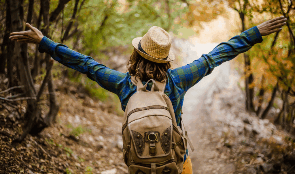 A picture showing a person outside in nature, showing that walking connects us to nature. 