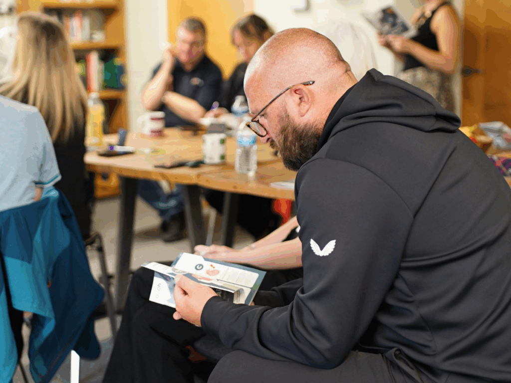 Person on first aid course learning how long first aid training lasts.