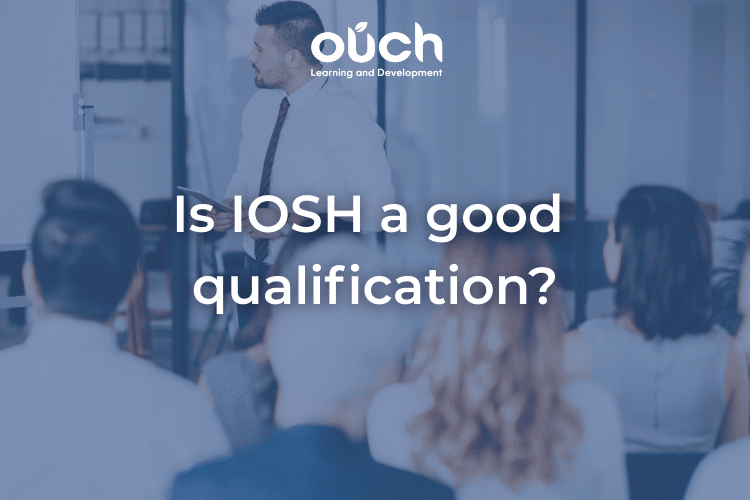 An image of a class of students looking at a whiteboard on a IOSH class.