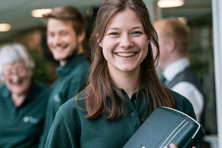 An employee who has been selected as the first aider for their work